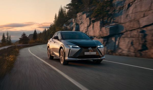 A Lexus RZ driving on a road