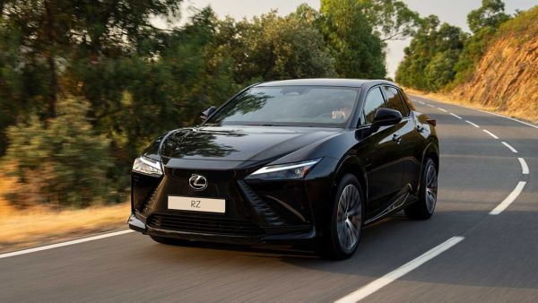 An all-new Lexus RZ driving on a rural road