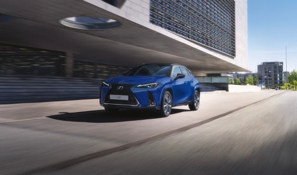 Lexus UX driving on city road
