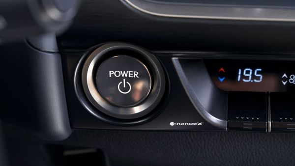 A closeup of the Lexus UX power button