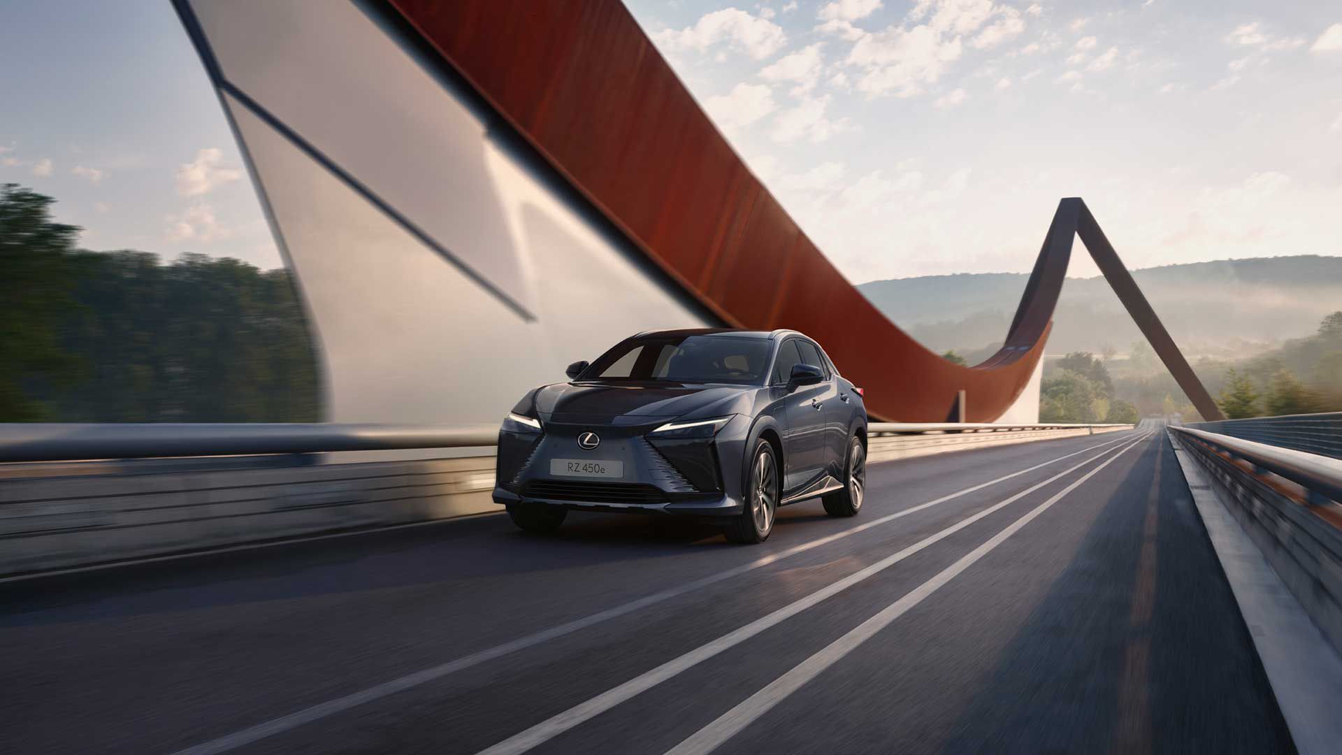 A Lexus RZ driving on a road
