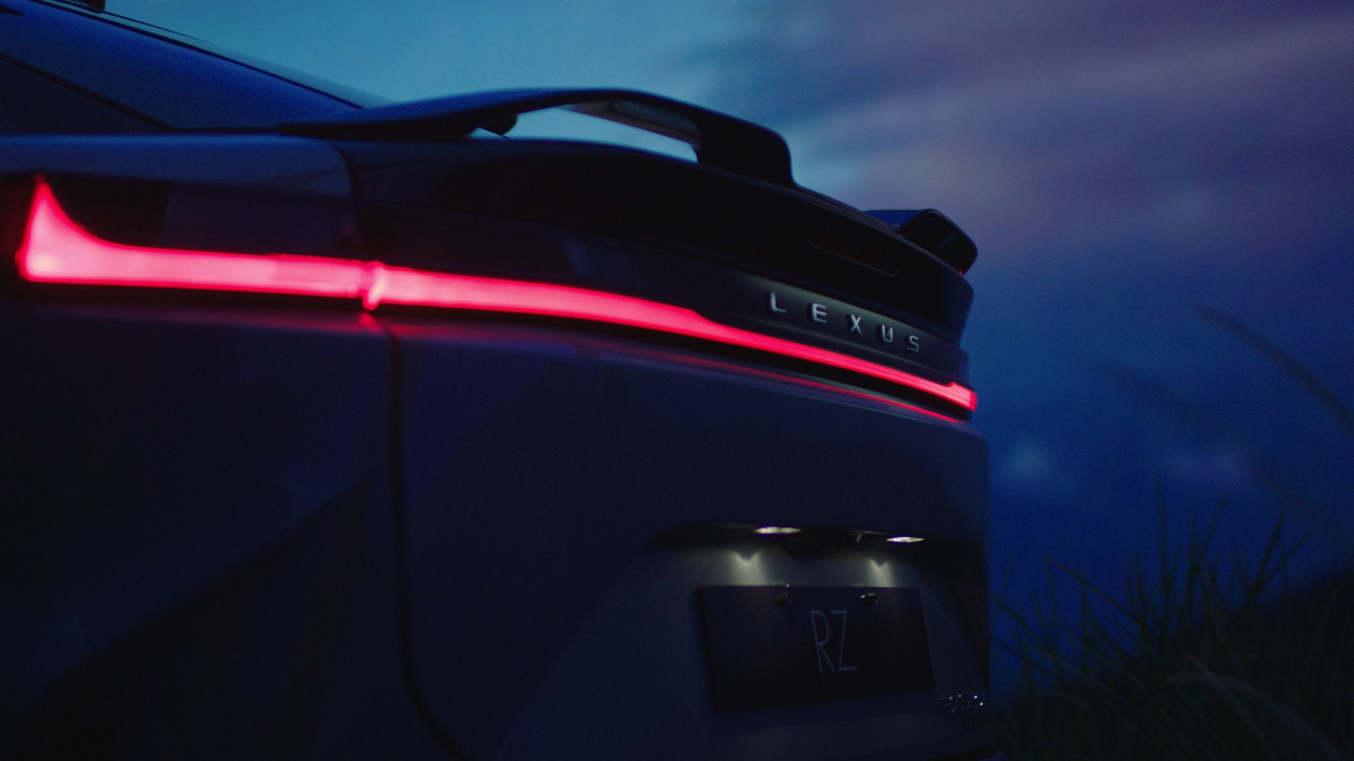 Rear three-quarter view of a parked Lexus UX 300h