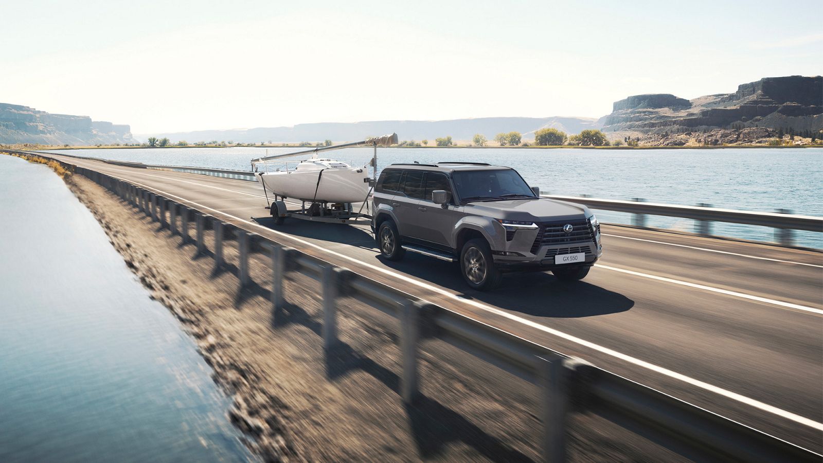 A Lexus GX towing a boat