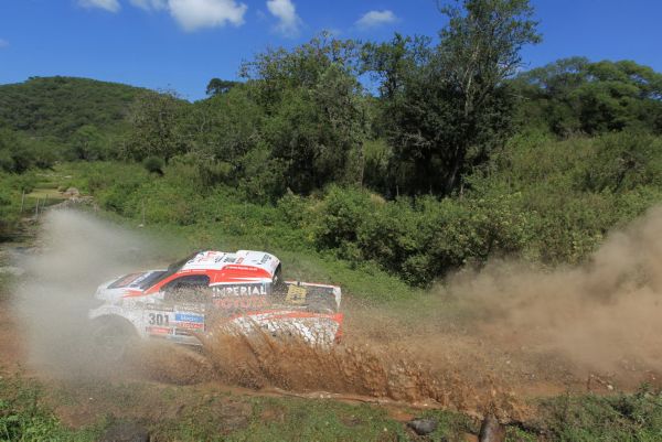 Powerful and dynamic front 3/4 shot of commercial Hilux model in beautiful mountain scenery