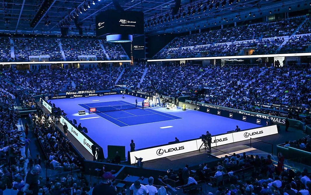 A tennis player serving during an ATP event