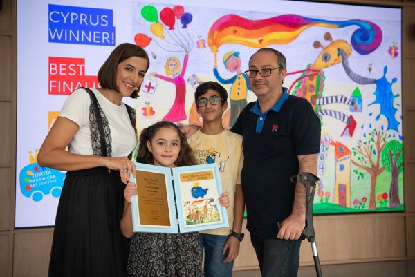 Toyota Dream Car Art Contest 2023 winner with her family