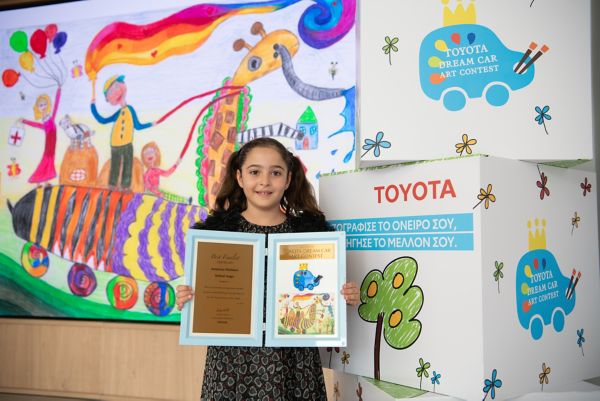 Toyota Dream Car Art Contest 2023 winner with her present