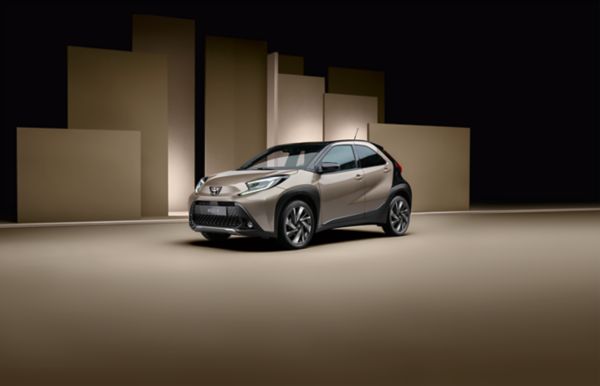 person running past a Toyota C-HR outside