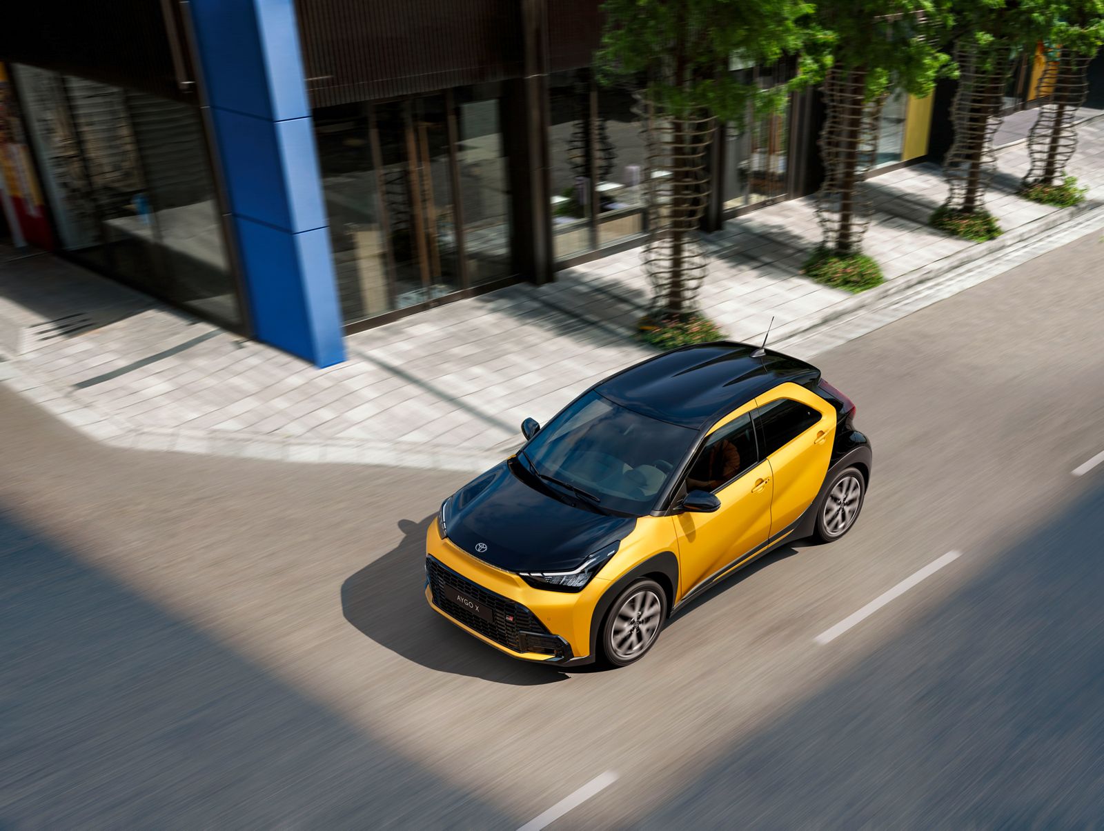 Looking in through Aygo X’s open premium canvas roof 