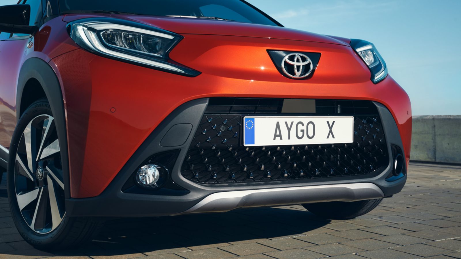 Imposing 18" alloy wheels under oversized fenders give Aygo X a wider stance.