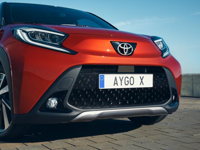 Imposing 18" alloy wheels under oversized fenders give Aygo X a wider stance.