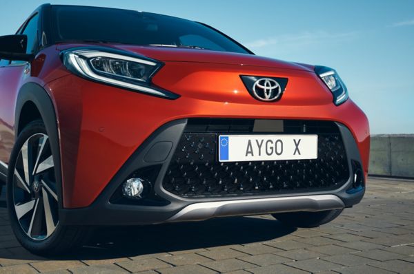 Imposing 18" alloy wheels under oversized fenders give Aygo X a wider stance.