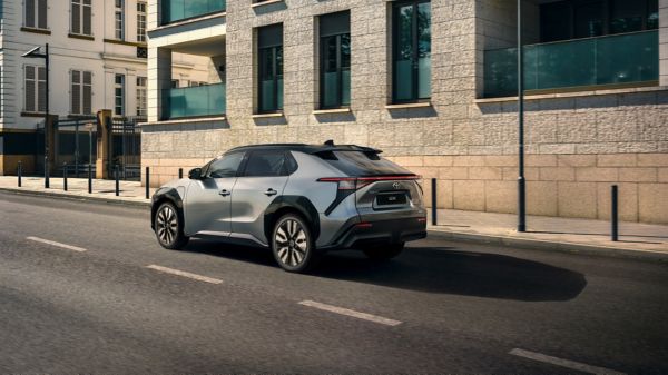 A Toyota bZ4X on the move in the city