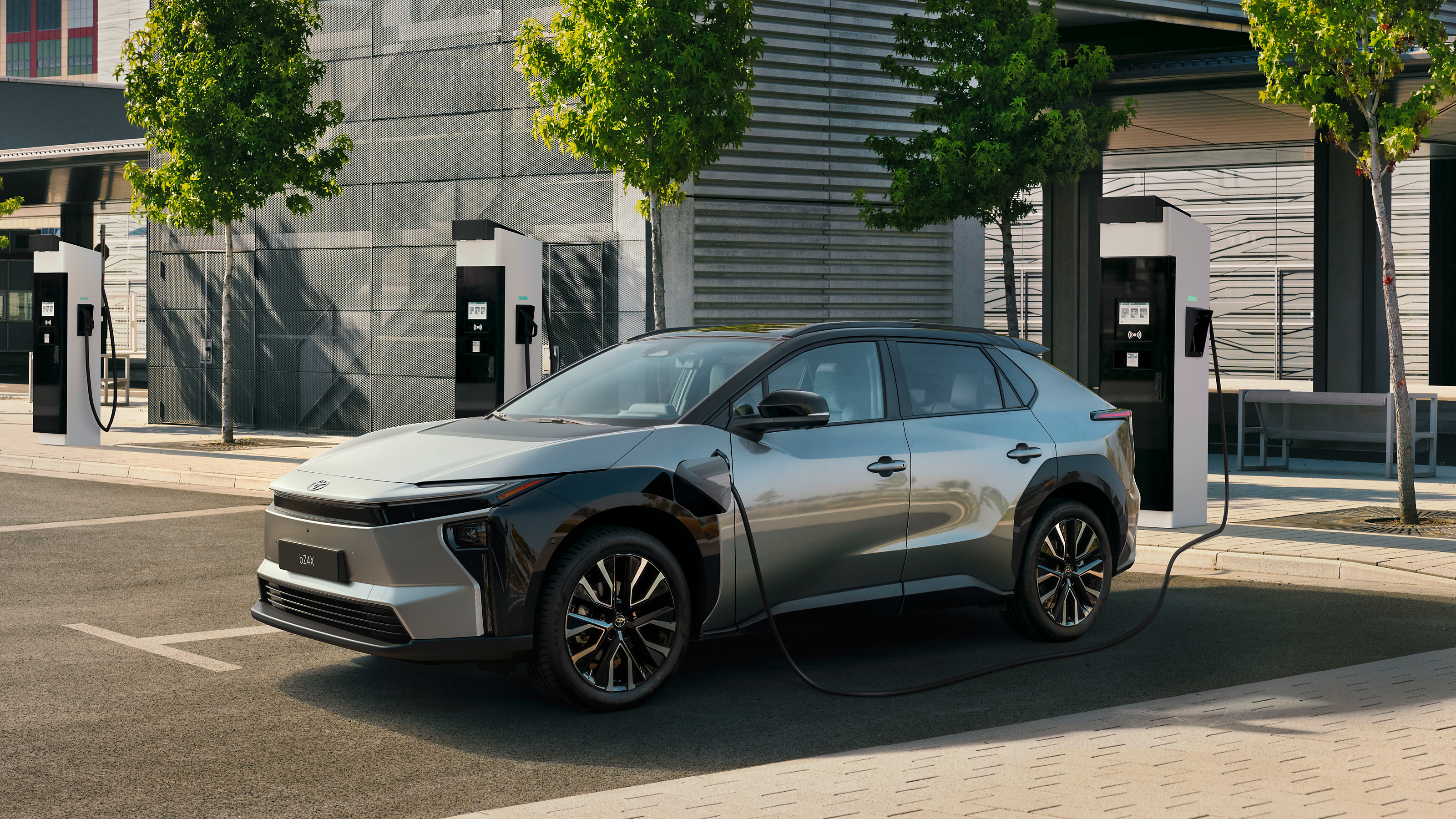 A Toyota bZ4X charging using a public charger