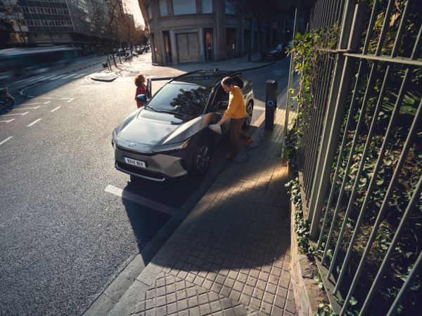 Toyota bZ4X people around the car