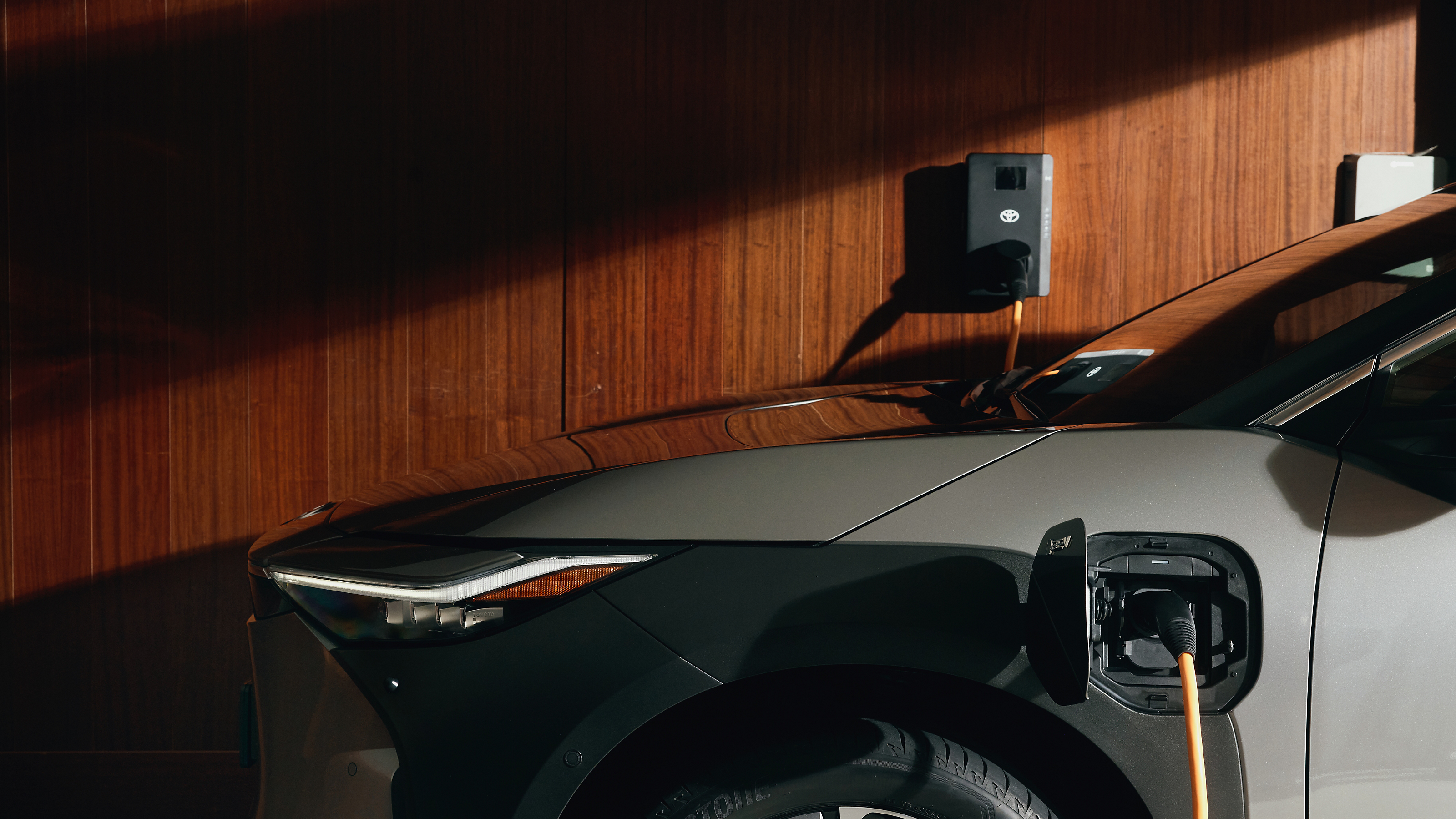 The all-electric Toyota bZ4X in the city 	