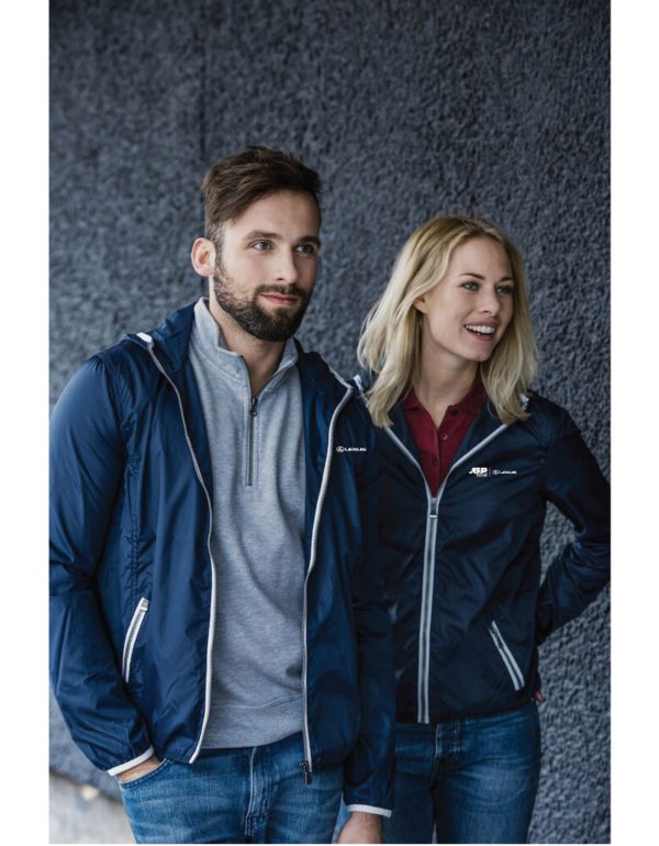 A man and a woman wearing Lexus Butik branded clothing