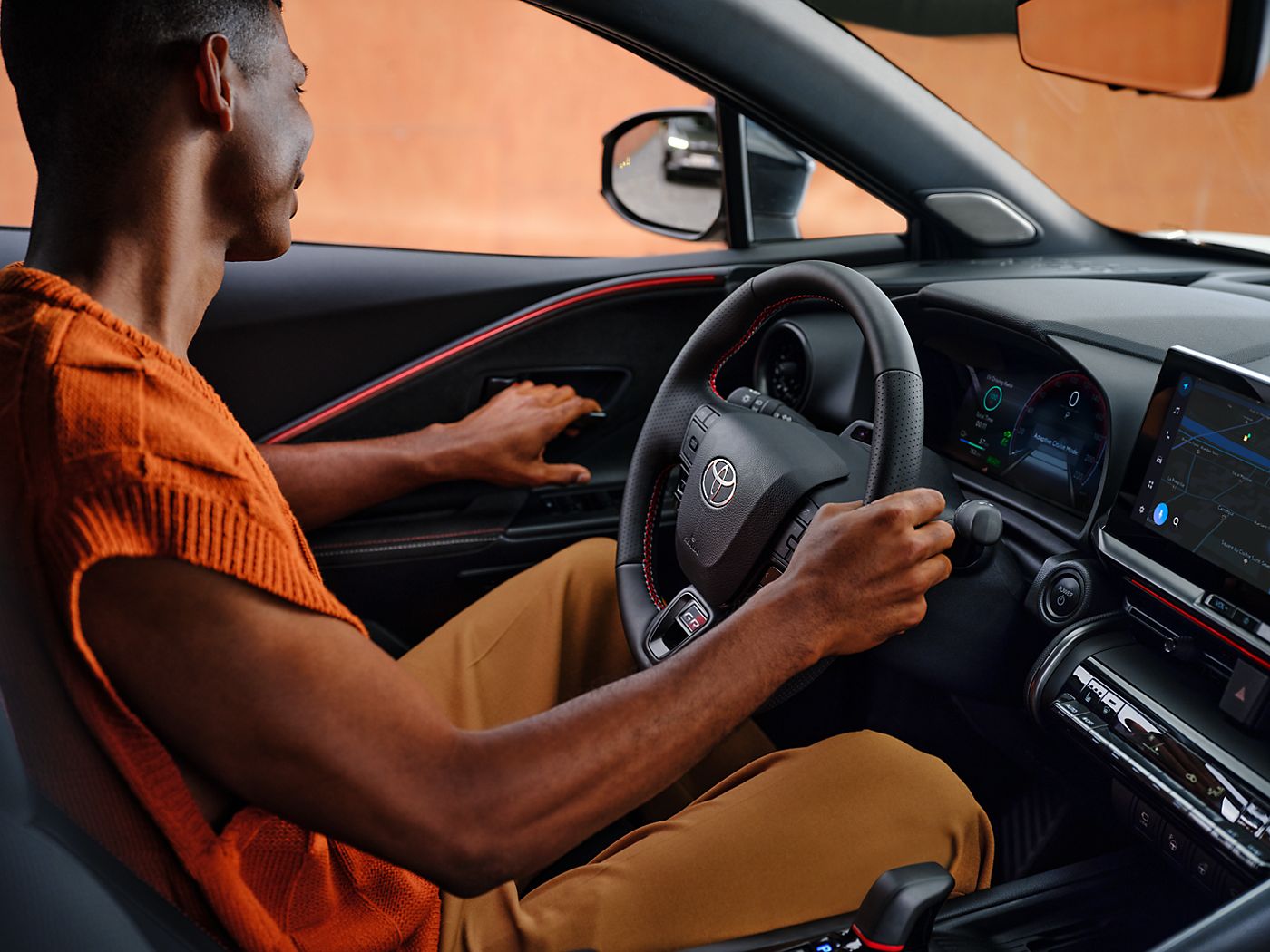 Toyota C-HR customer about to open the door of the car