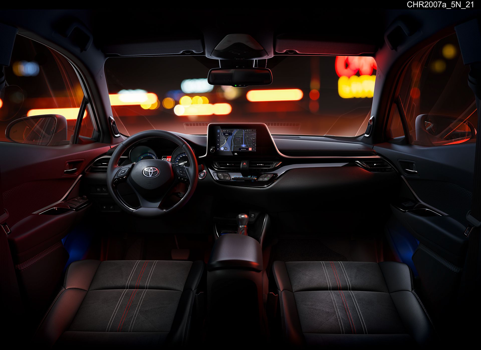 "Cockpit showing seats in Black Alcantara® with black leather bolsters and silver & red stitching and Toyota Smart Connect" 