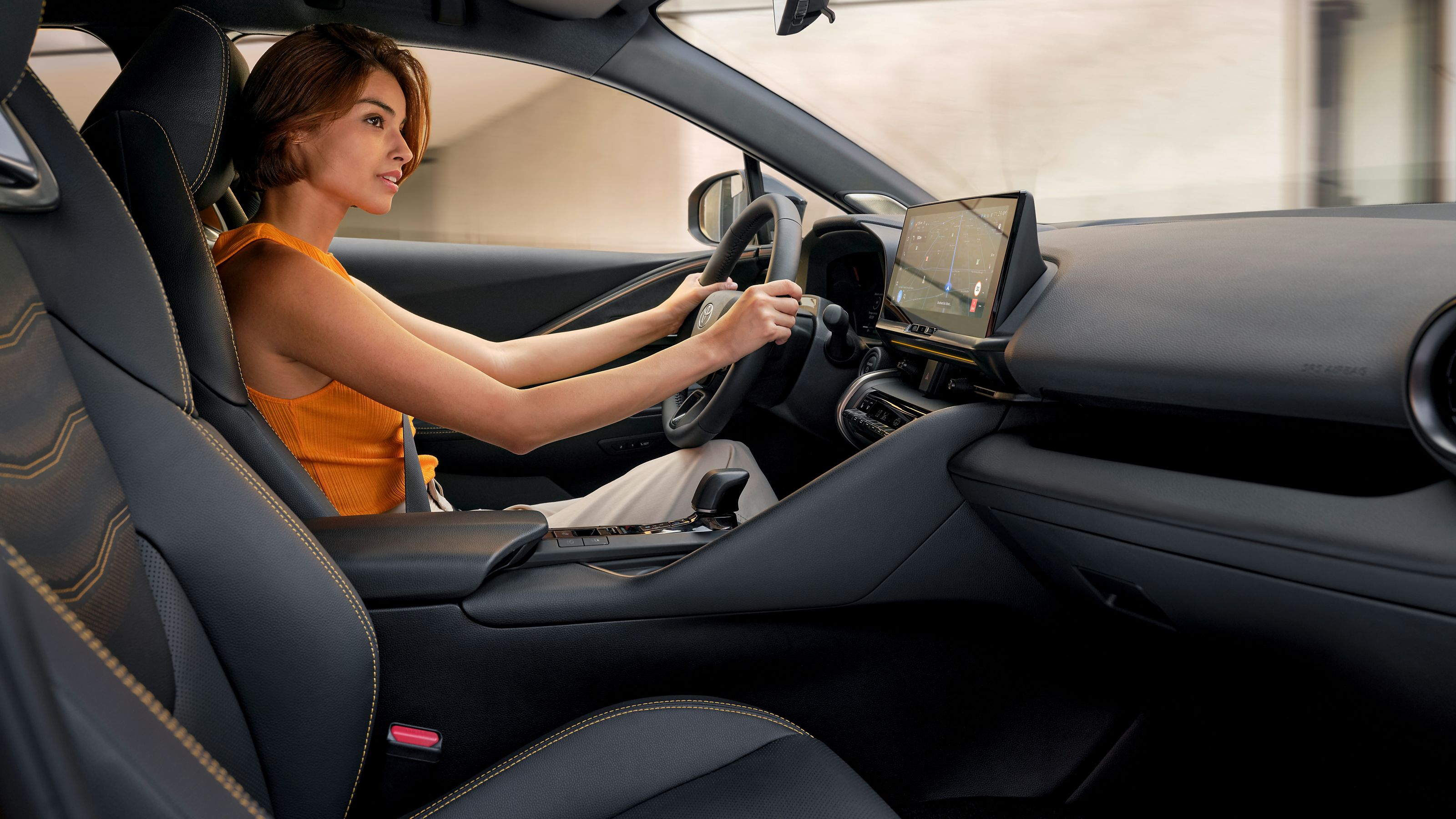 Toyota C-HR customer, confident behind her steering wheel