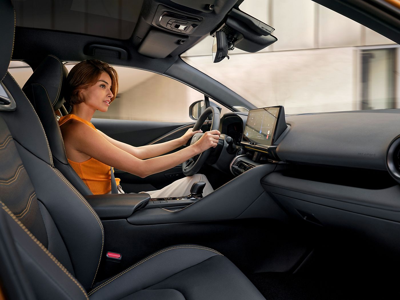 Toyota C-HR customer, confident behind her steering wheel
