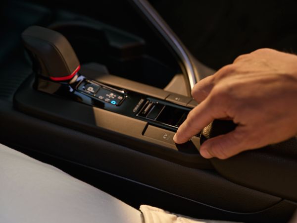 person using the inside of the Toyota C-HR