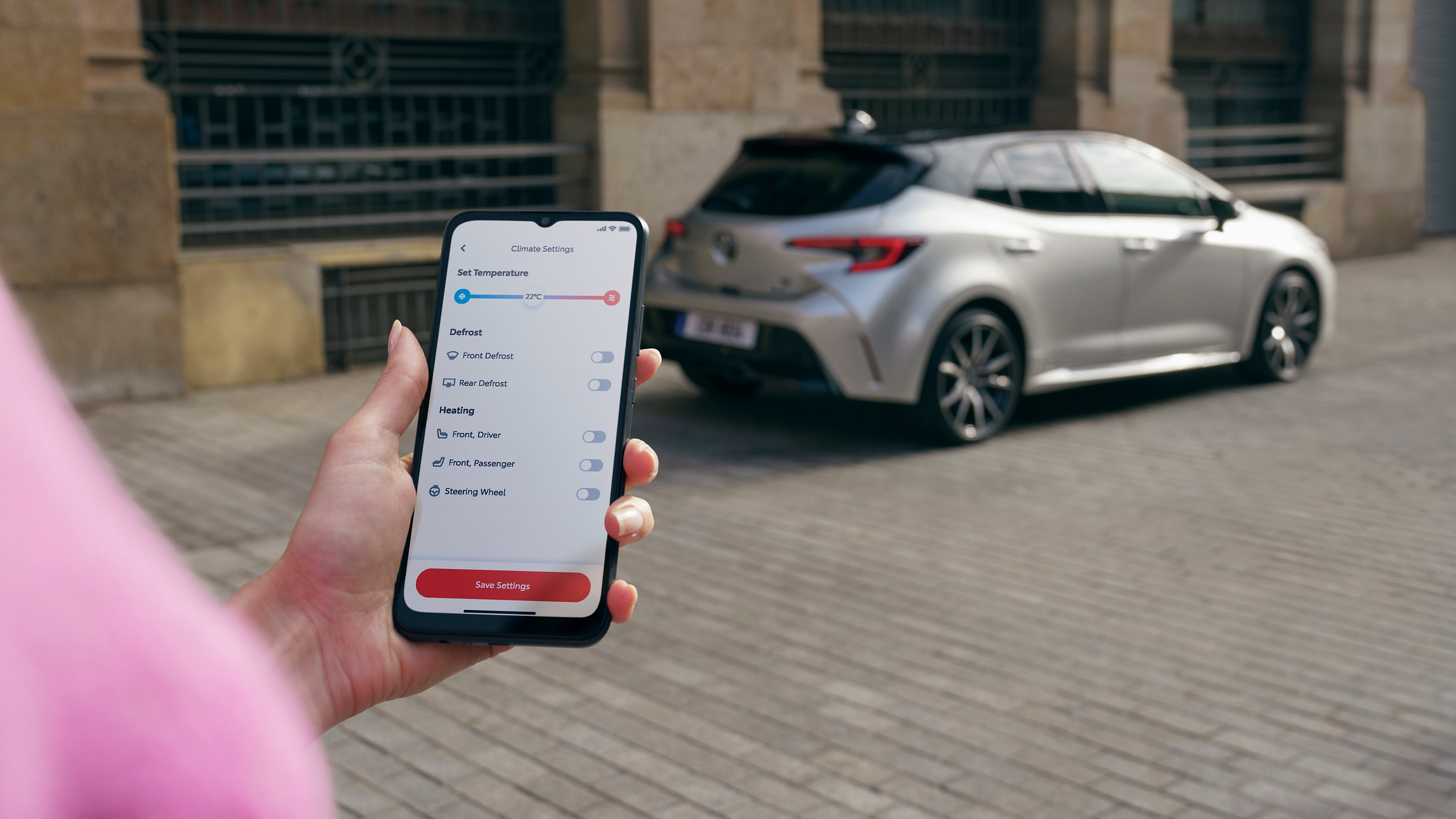 An owner uses the MyToyota smartphone app 