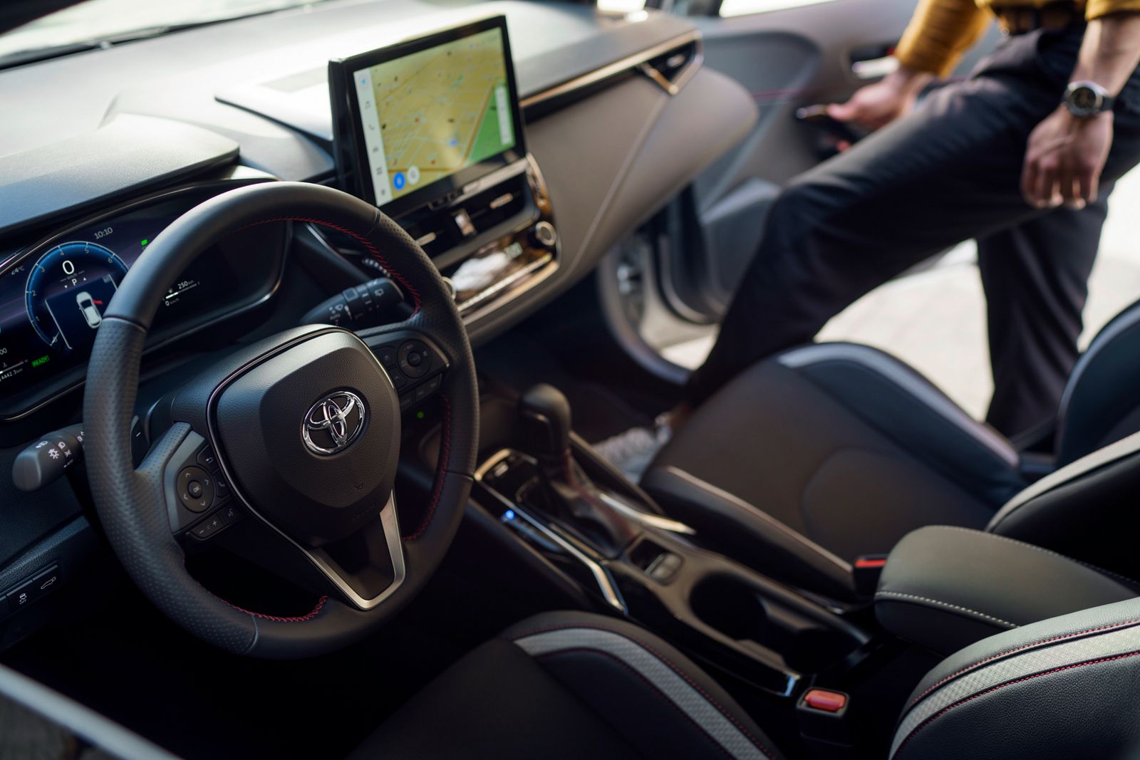 The Corolla’s steering wheel and multimedia touchscreen