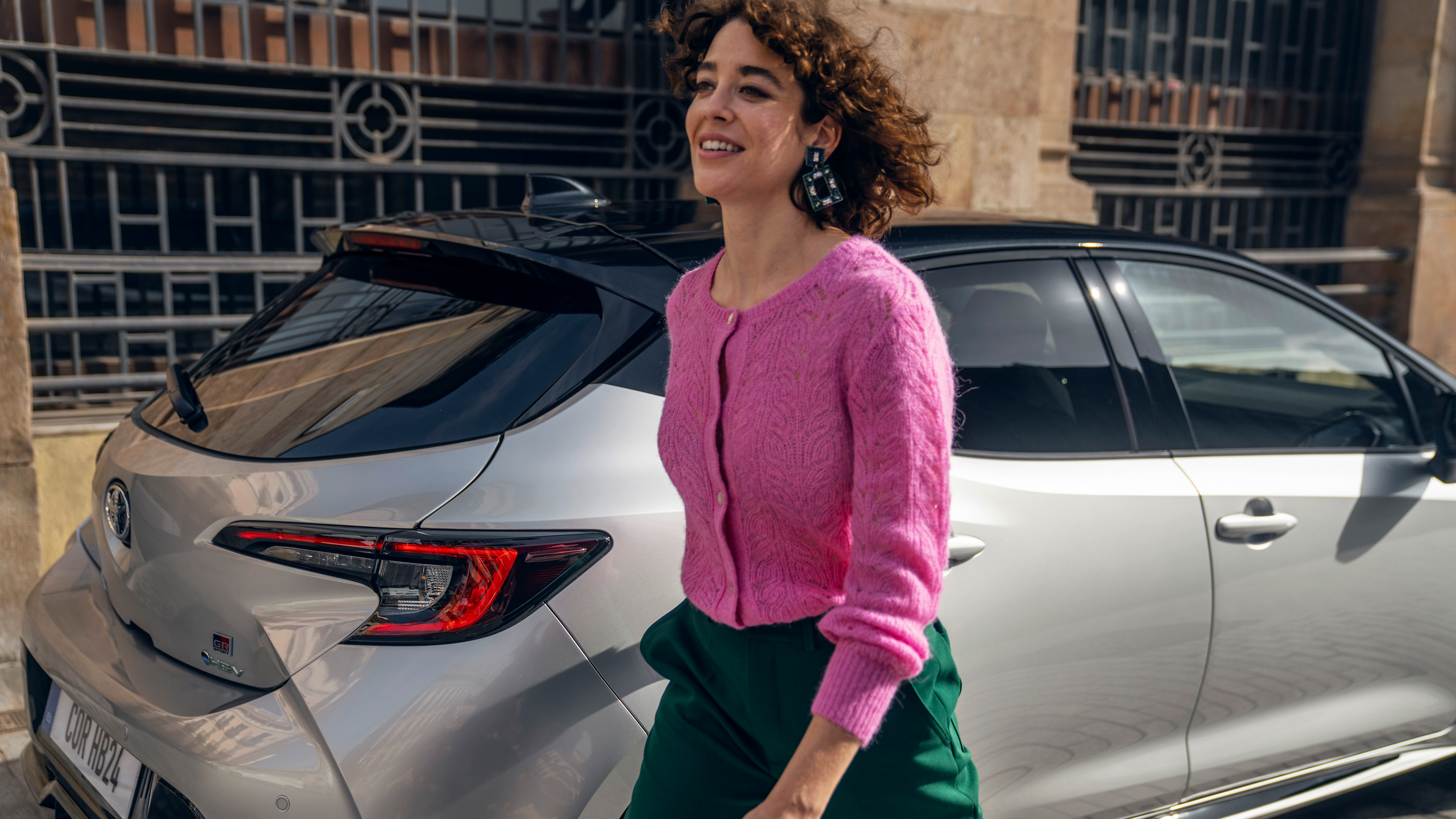 An owner walks away from their Toyota Corolla Hatchback 