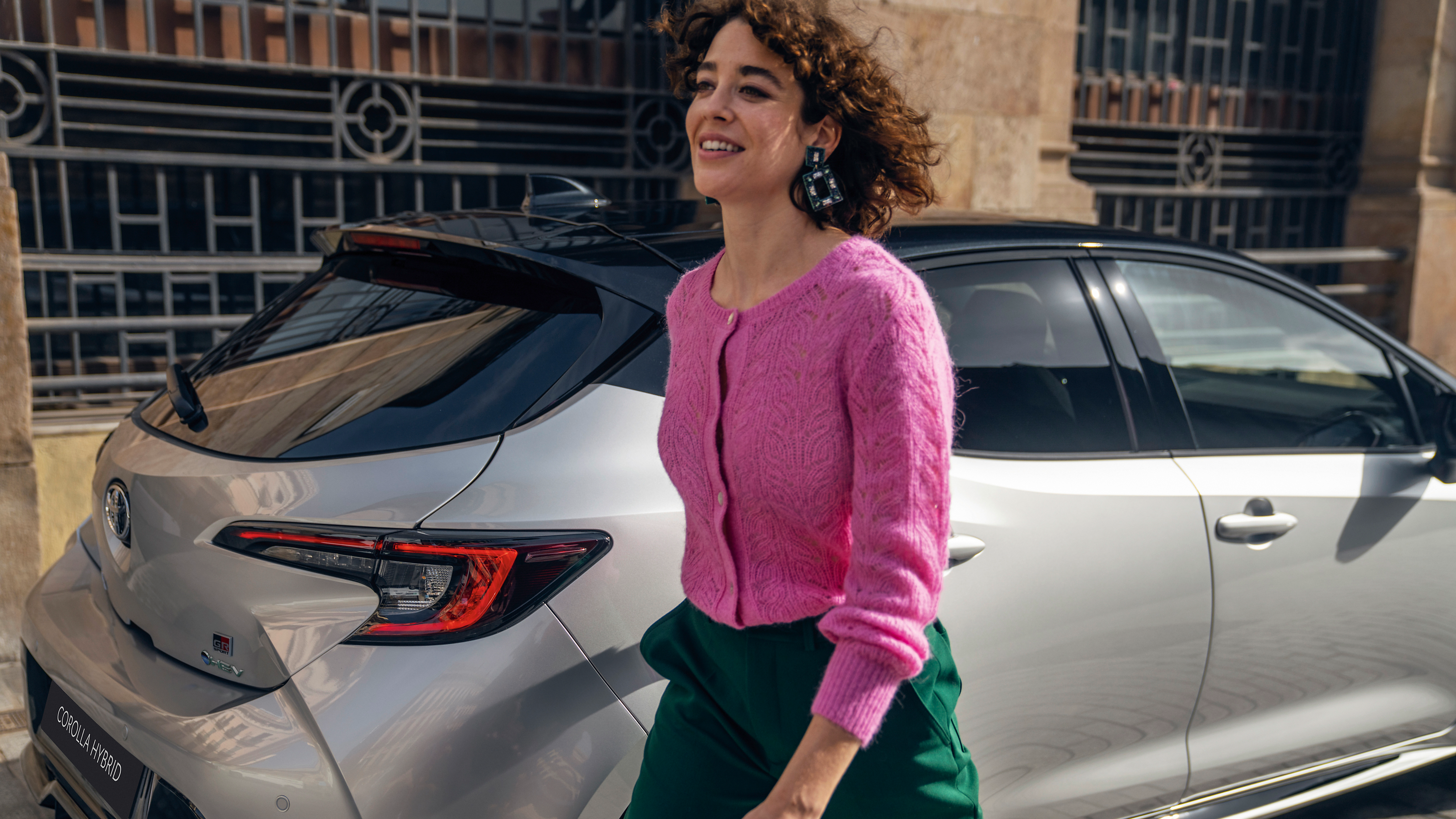 An owner walks away from their Toyota Corolla Hatchback 