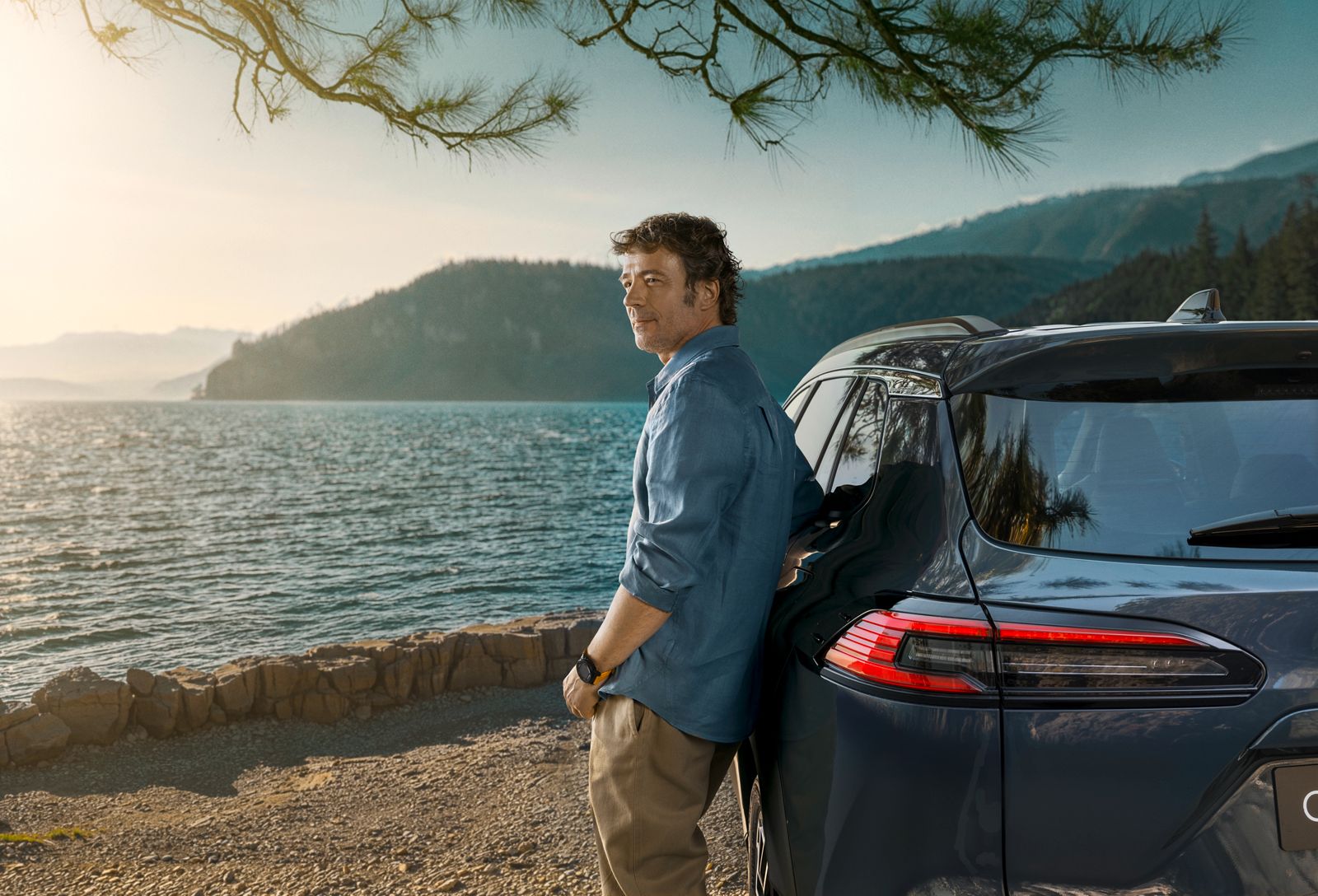 A Corolla Cross owner relaxes in a beautiful outdoor space