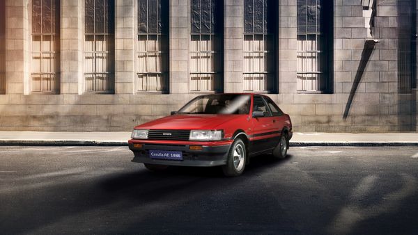 Toyota Corolla old style in a parking spot