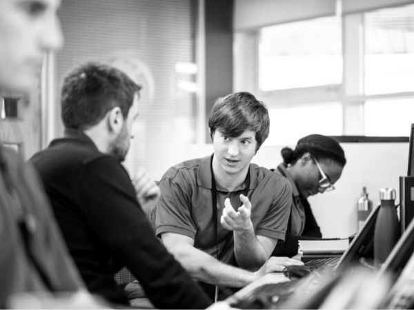 Man having a conversation while pointing