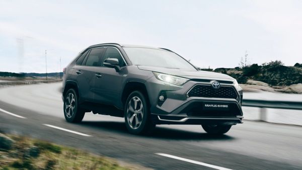 Toyota RAV4 Plugin driving along a road