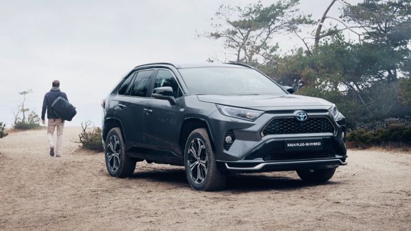 Toyota RAV4 Plugin parked on sand