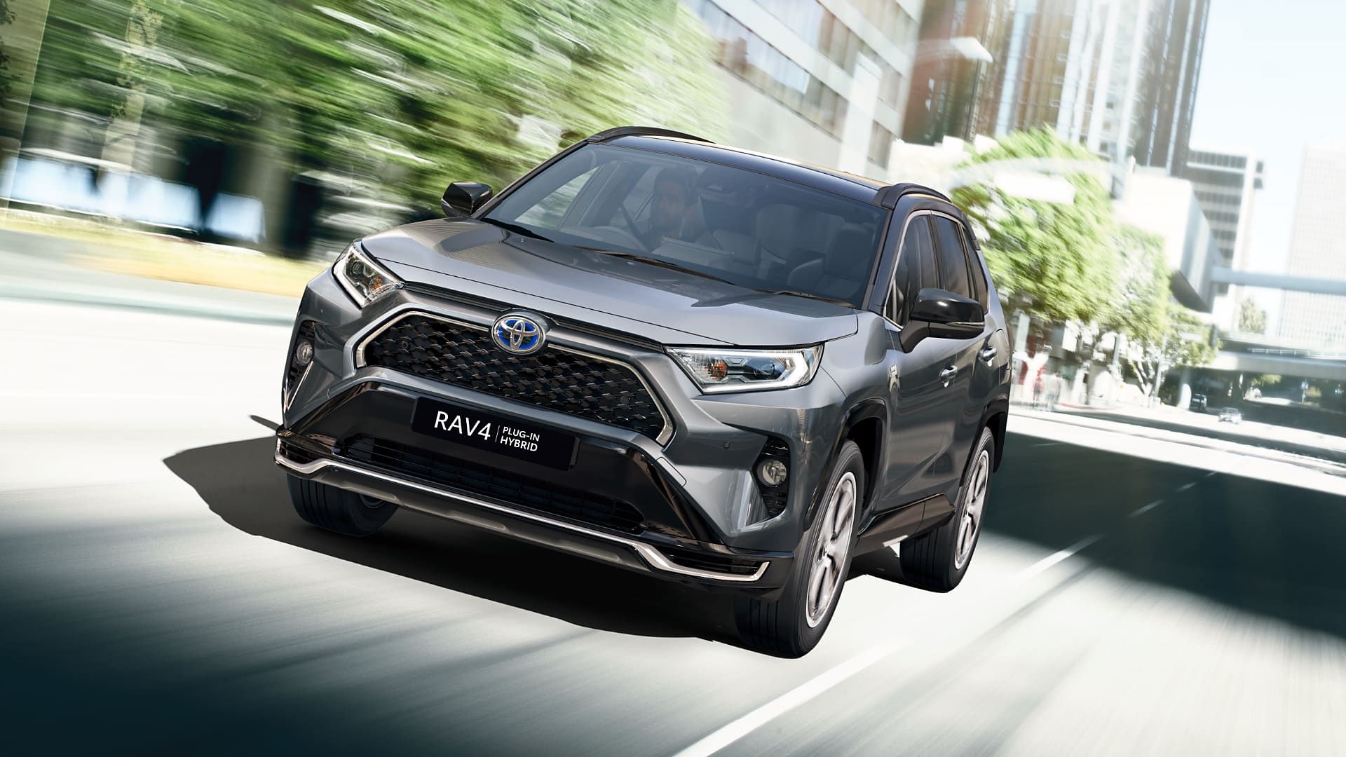 Toyota RAV4 Plugin driving along a road