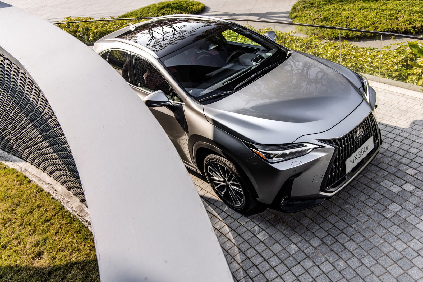 Lexus NX plugged into a Wallbox charger