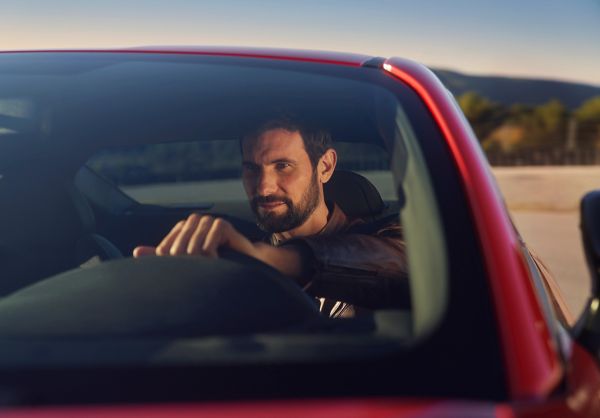 person driving inside a Toyota car