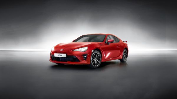 Toyota GT86 in red next to other cars