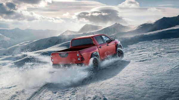 Toyota Hilux driving in snow