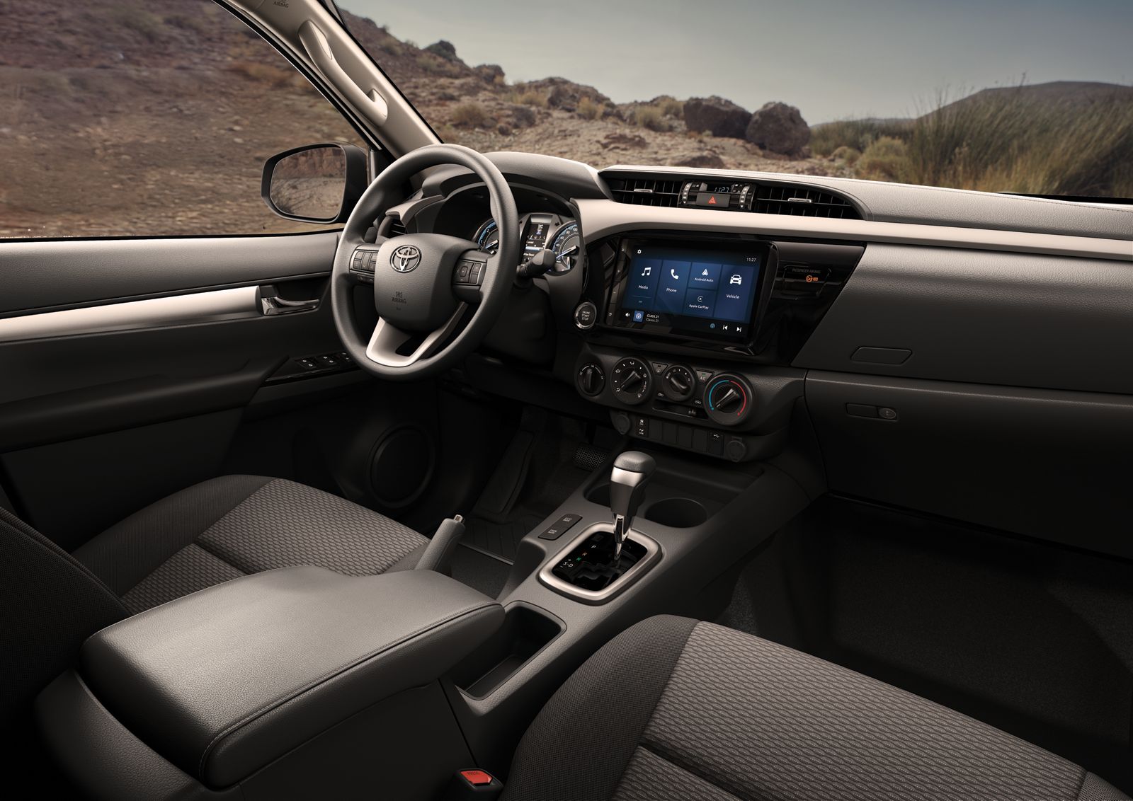 The Hilux's steering wheel and multimedia display