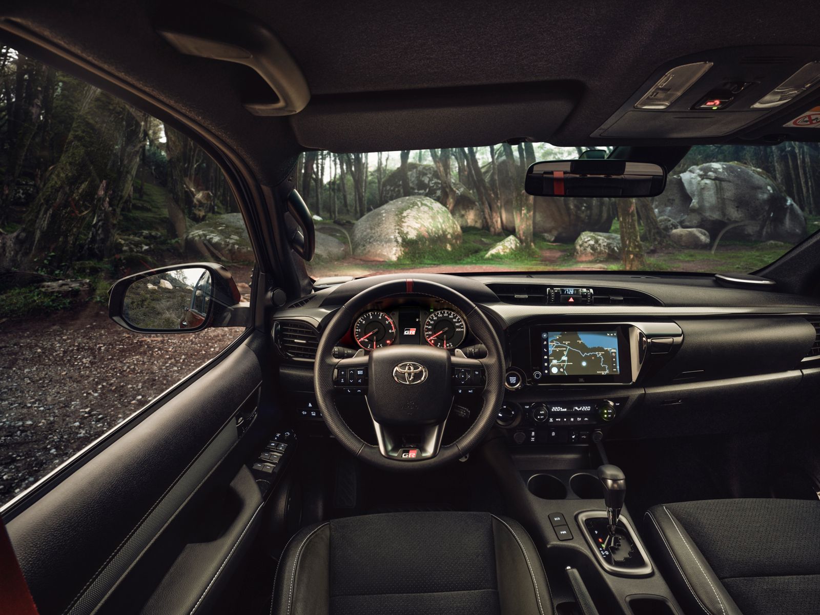 Perspective from the Hilux driving seat of a forest location