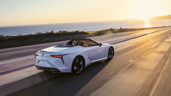 Lexus LC CV driving through a town