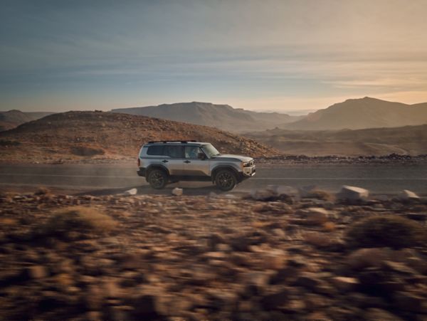 Land Cruiser driving on a road