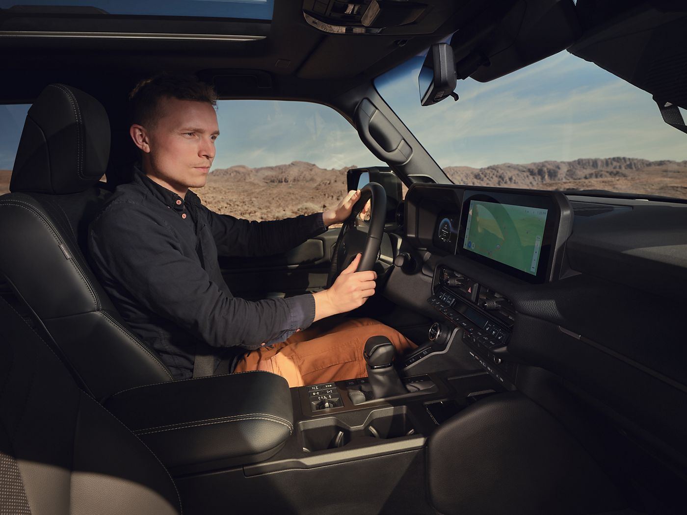 A driver experiences Land Cruiser’s smooth electronic power steering