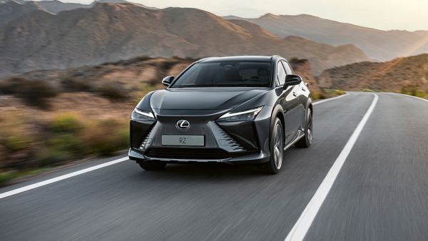 Lexus RZ 450e driving down the road