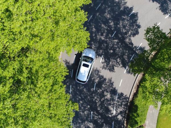 Aerial view of car driving on road