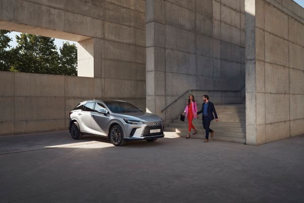 Lexus UX300 e driving along road