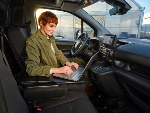 person working inside a Proace City Electric