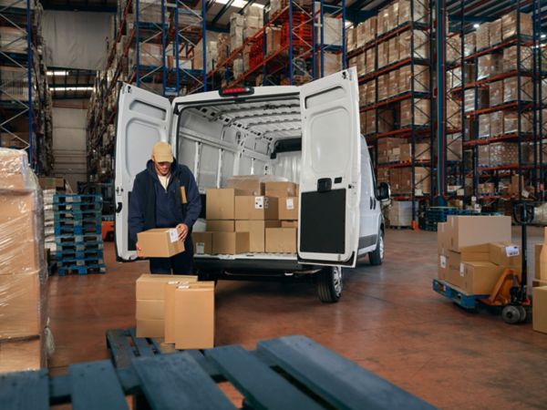 A Proace Max is loaded with packages 